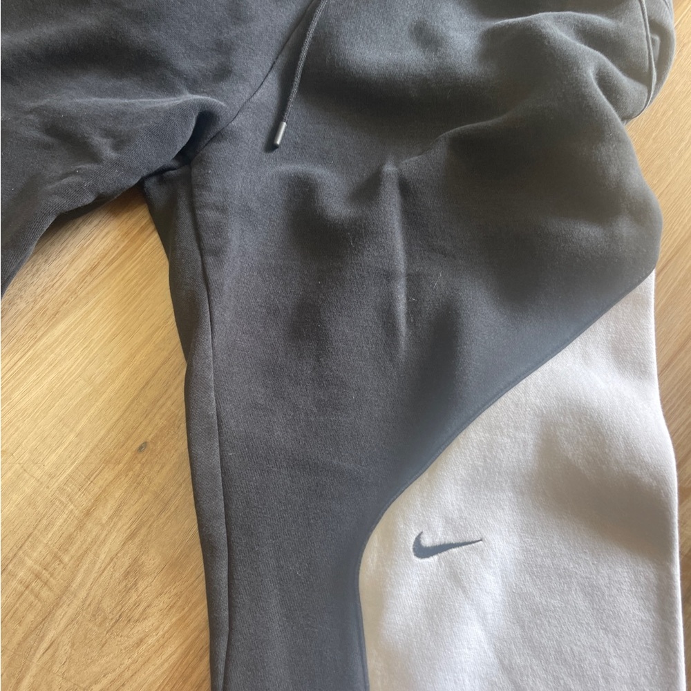 Vintage Nike Black and Gray Track Pants with Swoosh Logo